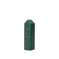 Side view of the tall dark green and gold Casa Calendar Candle