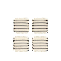 Four Broste Copenhagen Elouise cotton coasters in off white with black stripes and fringed edges