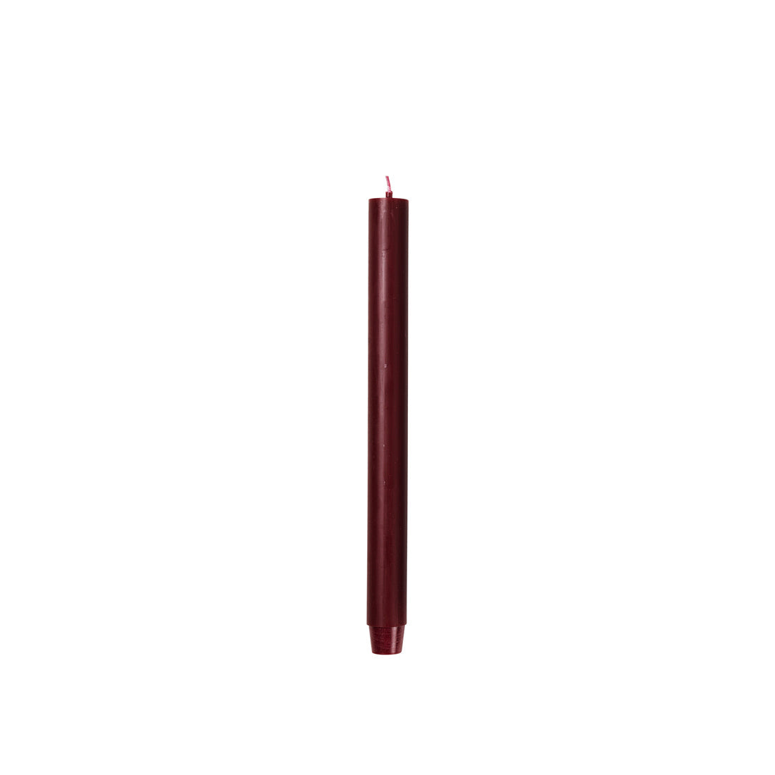 Broste Copenhagen Rustic Taper Candle in burgundy on a white background