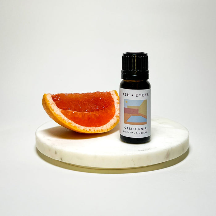 California Essential Oil Blend by Ash + Ember in 10ml amber glass bottle with citrus and cedar scent