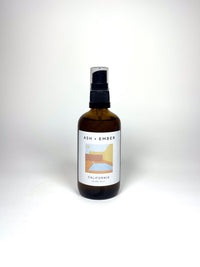 California Home Mist by Ash + Ember in amber glass bottle, citrus and cedar scent