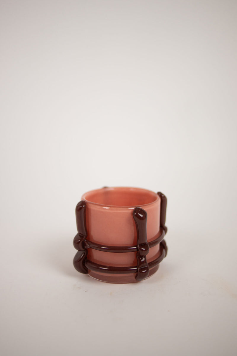 Caramel pink glass votive with dark brown wrapped bands by Olsson & Jensen