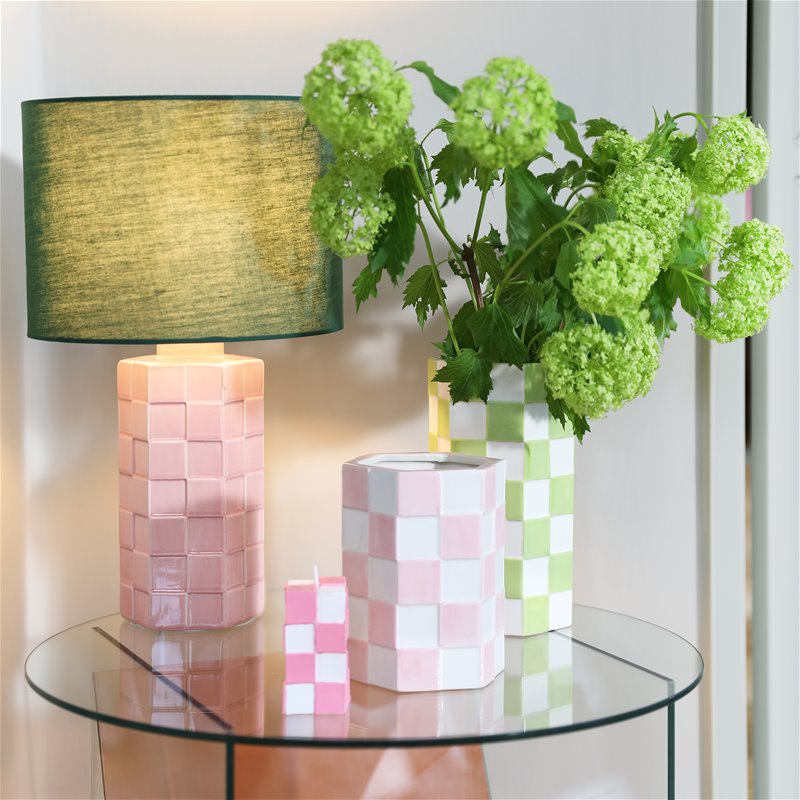 pink checkered table lamp by &k Amsterdam with green shade styled on glass console with matching check accessories
