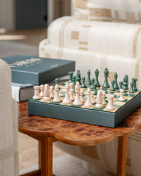Green and cream chess board ready for play