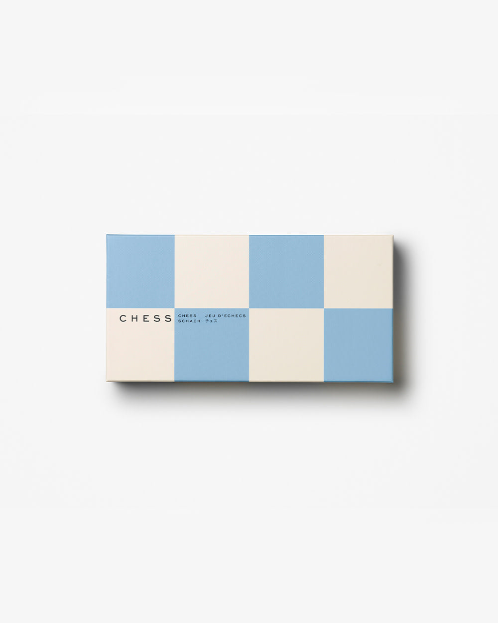 Closed blue and cream chess box with minimalist design