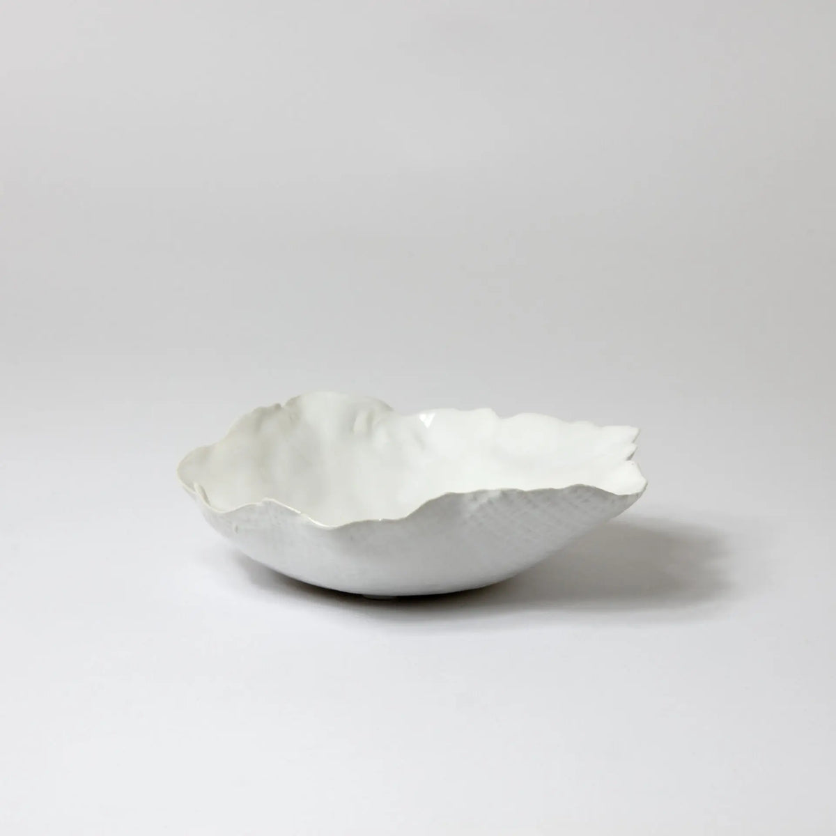 Claire white handmade ceramic saucer or small plate by Olsson & Jensen