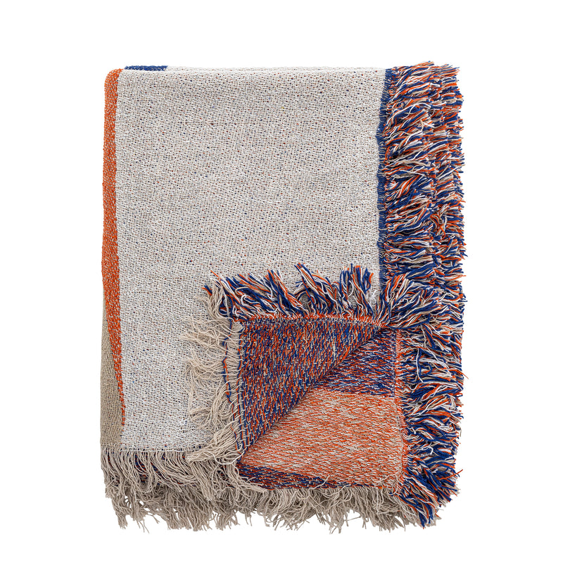 Recycled cotton throw by Bloomingville folded showing coral and blue fringes