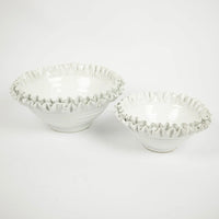 Two Claudine white ruffled edge ceramic bowls by Olsson & Jensen