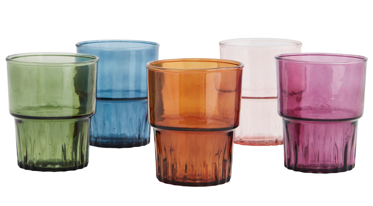 set of colourful drinking glasses in green blue amber rose and purple
