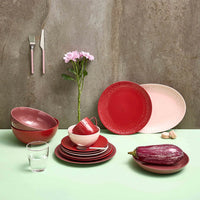Confetti candyfloss cutlery styled with pastel tableware and flowers