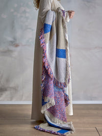 Clarita Throw by Bloomingville draped over arm in soft natural setting