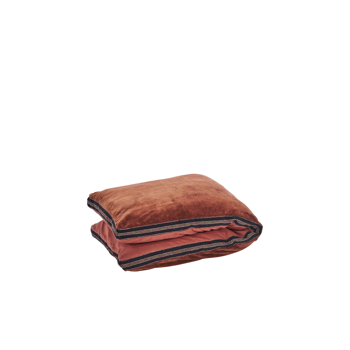 folded cotton velvet mattress in burnt red with black woven band