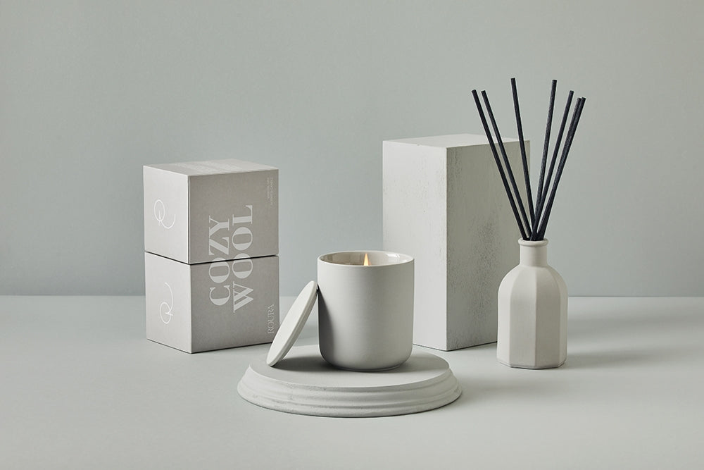 Cozy Wool ceramic candle with matching gift box and reed diffuser in soft grey tones
