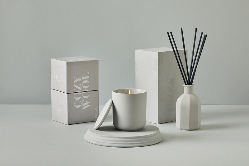 Cozy Wool ceramic candle with matching gift box and reed diffuser in soft grey tones
