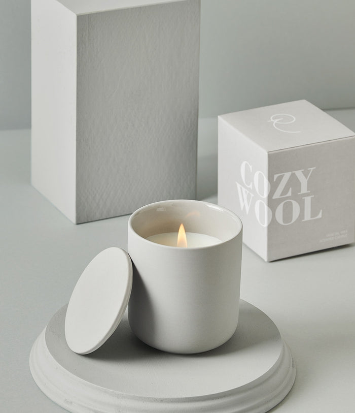Cozy Wool scented candle in matte grey ceramic vessel with lid and gift box
