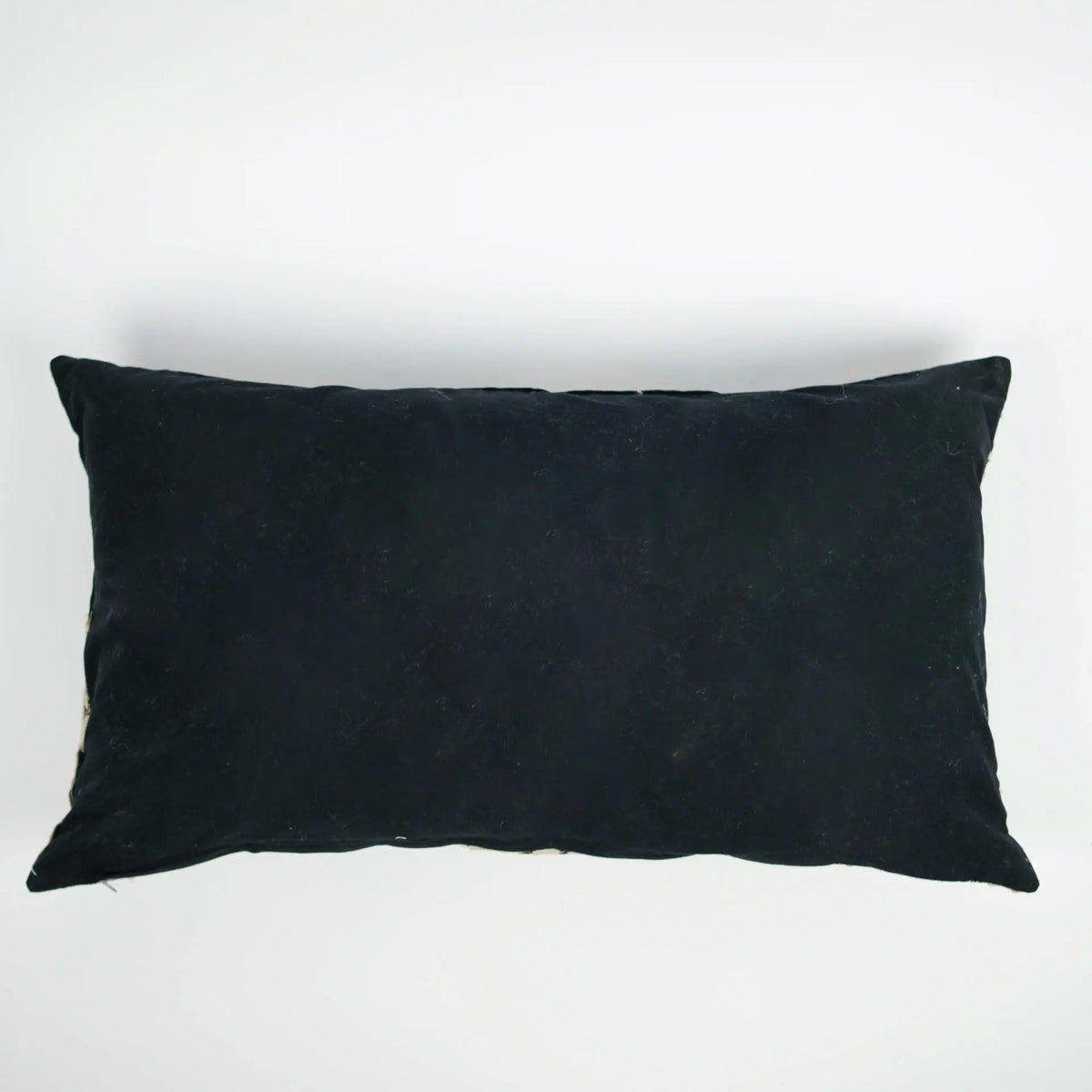 Plain black reverse of the Dahlia cushion by Olsson & Jensen