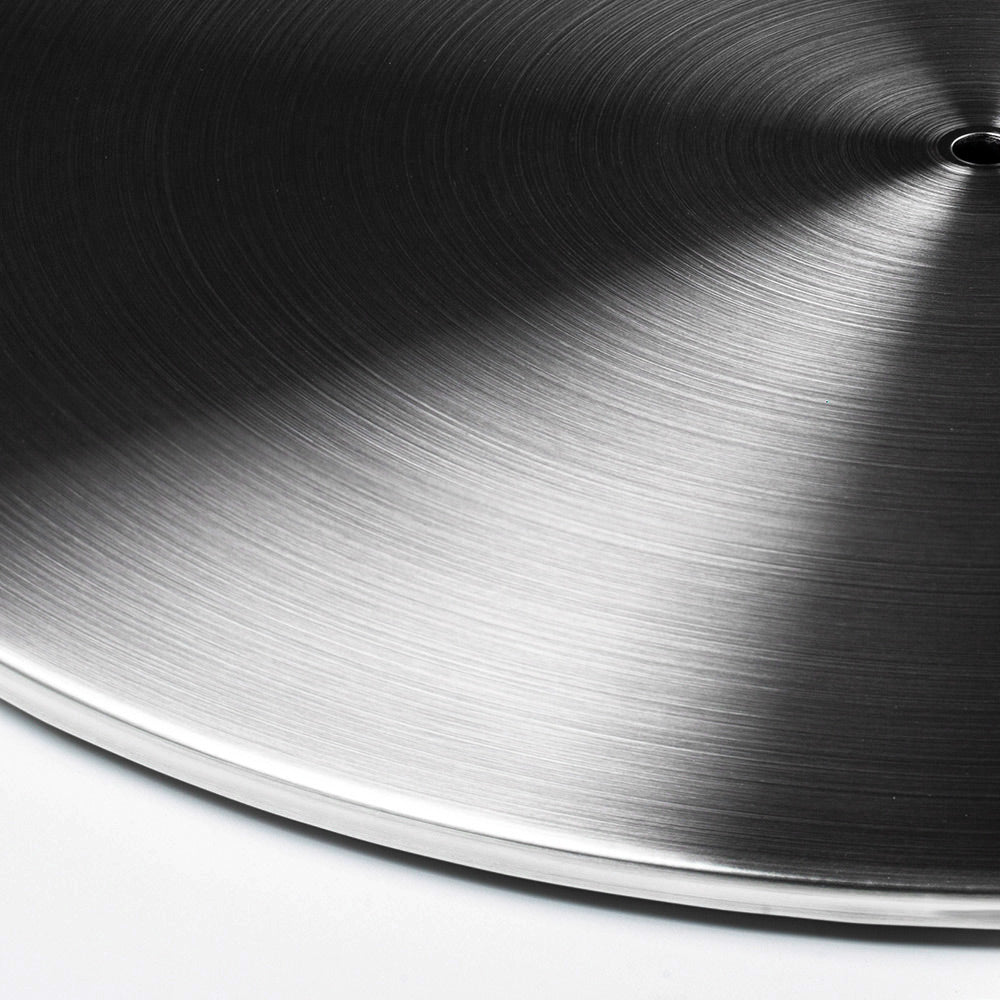 Close-up of the brushed finish on the Stainless Steel Le Feu Dome Steel Plate