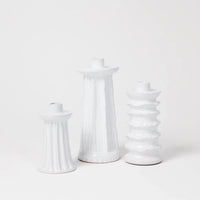 Dis, Ditte and Dana white terracotta candlesticks together by Olsson & Jensen