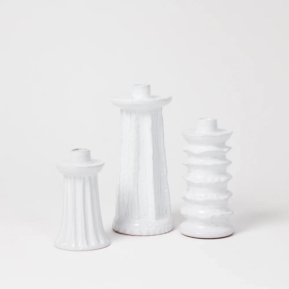 Dis, Ditte and Dana white terracotta candlesticks together by Olsson & Jensen