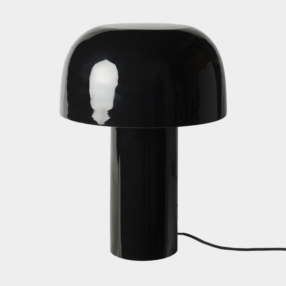 Diva glossy black metal mushroom table lamp by Olsson & Jensen on a white background