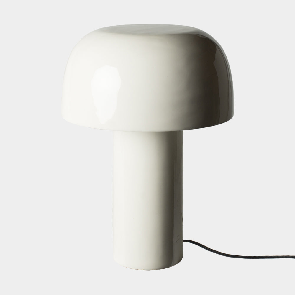 Diva glossy white metal mushroom table lamp by Olsson & Jensen on a white background