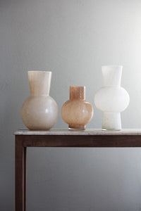 Dune sand glass vase by Olsson & Jensen styled with two other glass vases on a dark wooden console