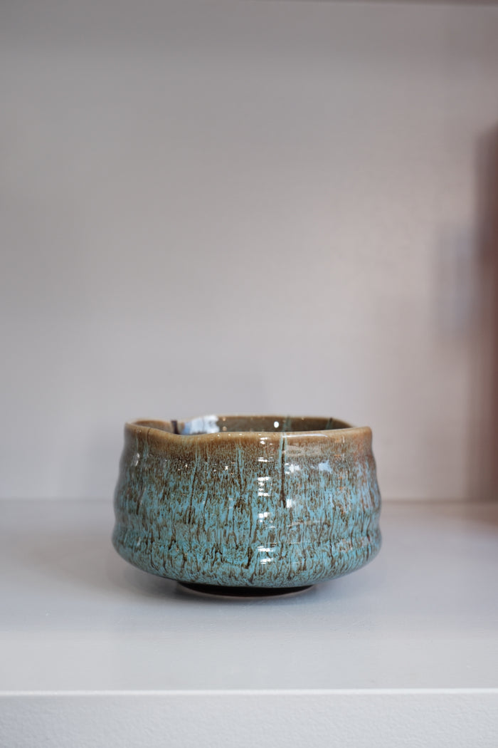 eco blue matcha bowl showing finger grooves and reactive glaze