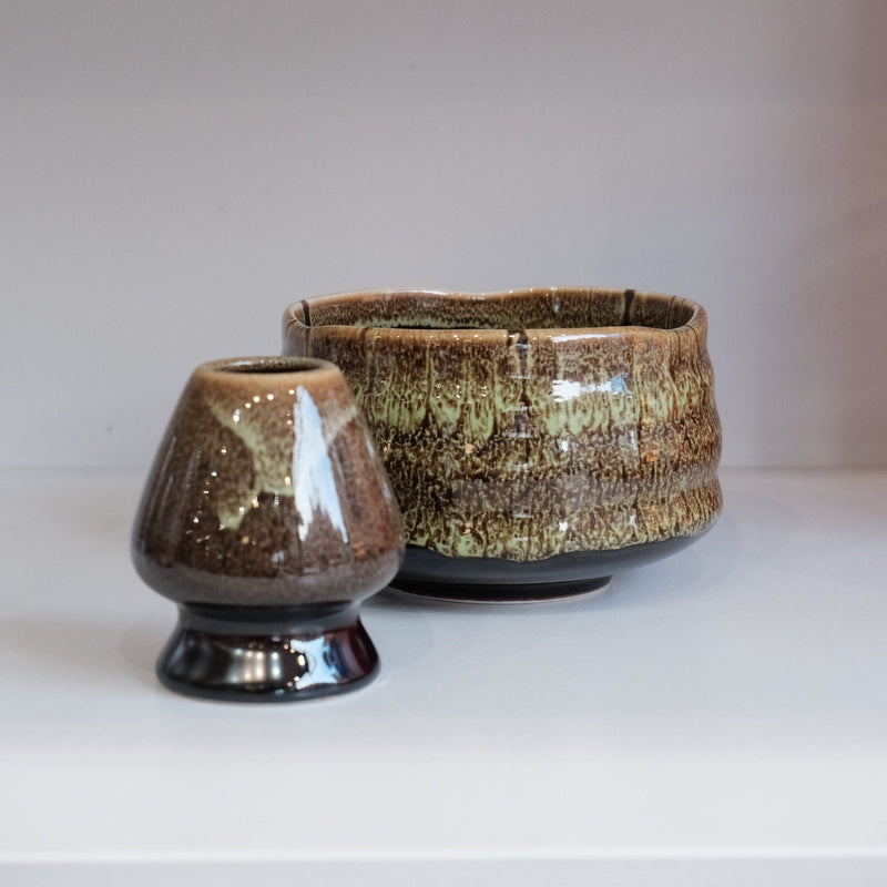 eco green matcha bowl with matching whisk holder in earthy green glaze