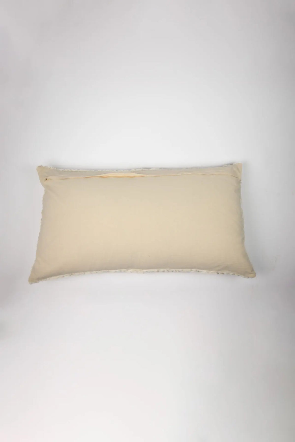 Plain cream cotton back of the Elba 50x90 cushion by Olsson & Jensen