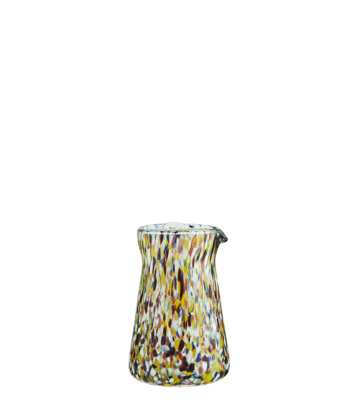 handmade glass milk jug with orange yellow and grey speckled pattern
