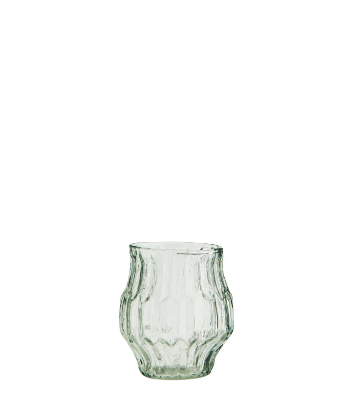 clear ribbed drinking glass with organic curved silhouette
