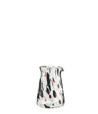 handmade glass milk jug with brown and white speckled pattern
