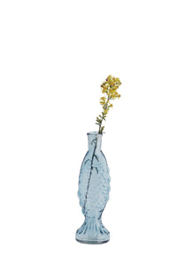Decorative vase with fish pattern containing a small plant on a white background