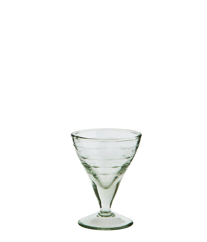 clear handmade cocktail glass with subtle cut detailing
