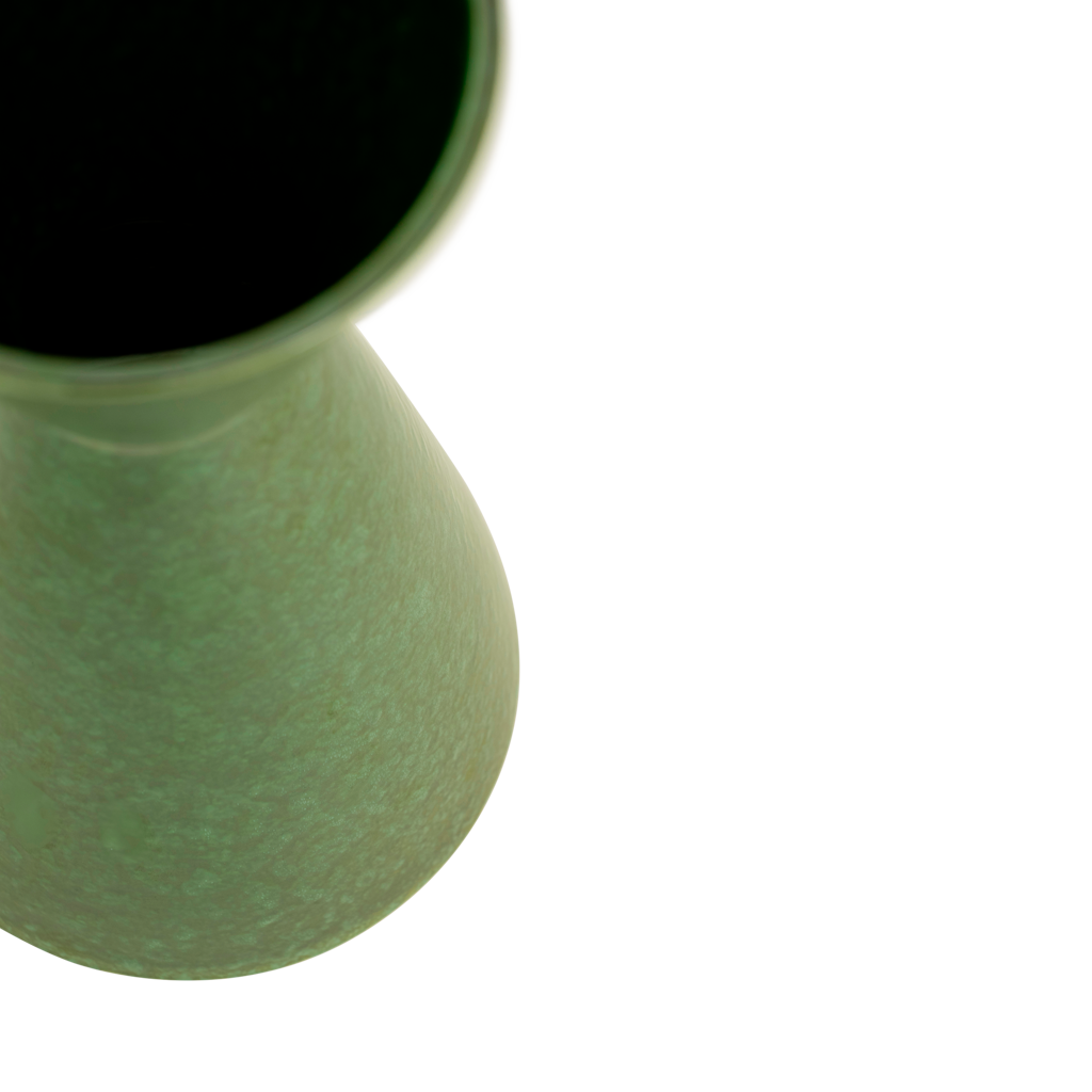 Close-up of the Faen vase's rim and glossy green reactive glaze