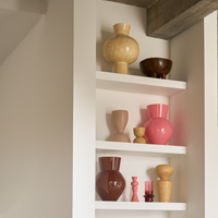 Urban Nature Culture vases displayed on white built-in shelves
