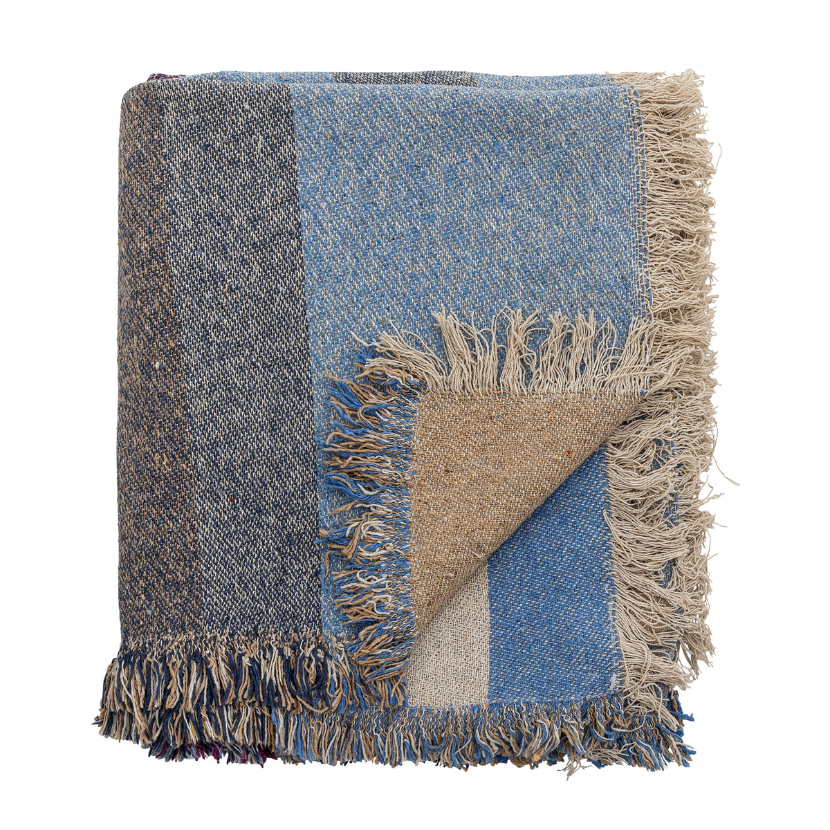 Folded fringed throw in blue and neutral tones