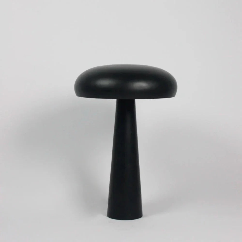 Fungi black metal mushroom table lamp by Olsson & Jensen on a white background