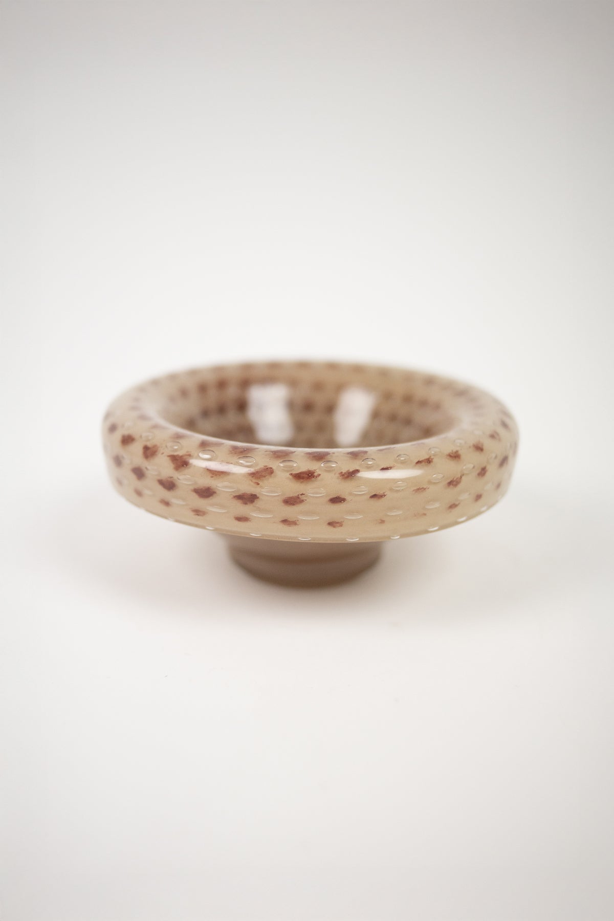 Gaston cream and brown speckled glass bowl on foot by Olsson & Jensen