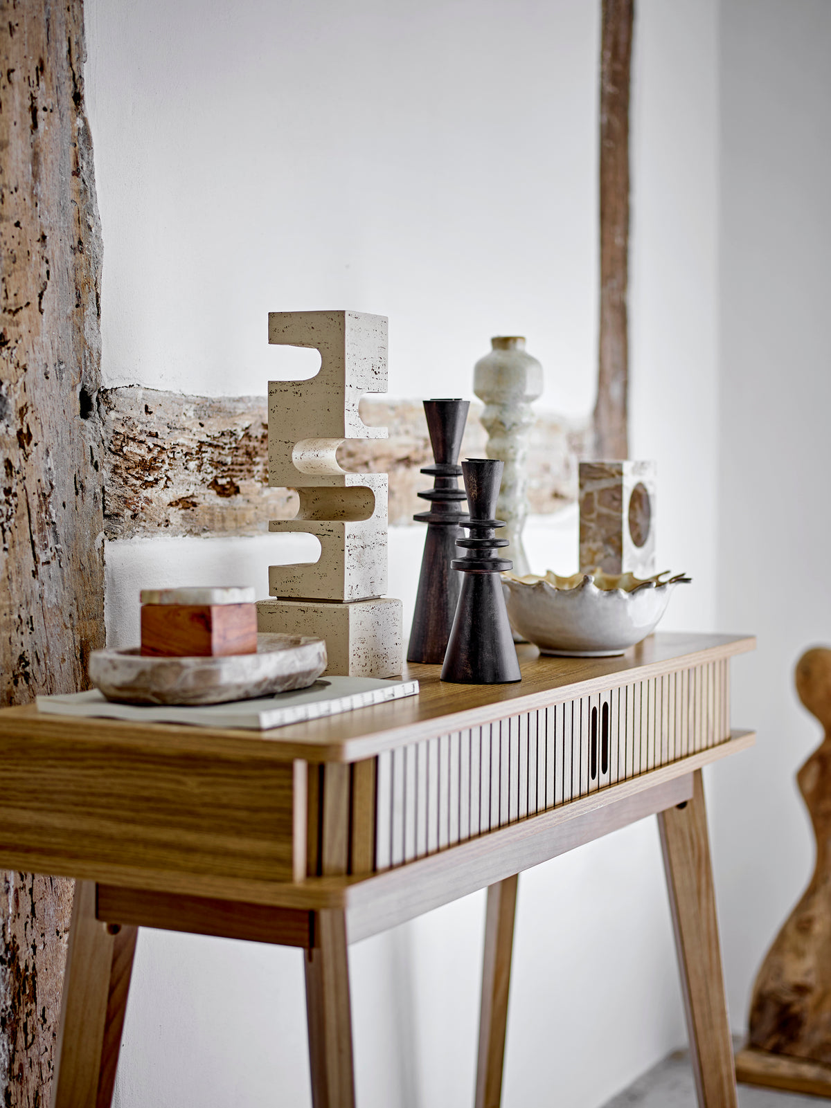 Abstract polyresin sculpture styled with Bloomingville home accessories