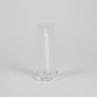 Gilly clear glass hurricane candle holder by Olsson & Jensen with a white taper candle