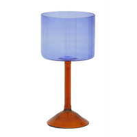Ice blue gin tonic glass with amber stem by Urban Nature Culture