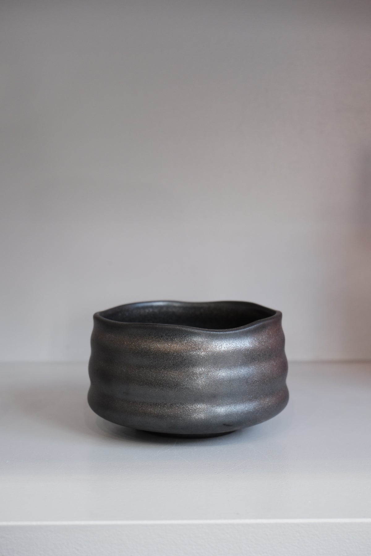graphite stoneware matcha bowl showing pencil lead style speckled finish