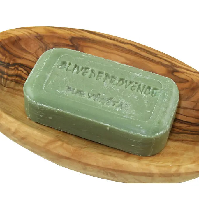 Natural olive soap with gentle fragrance for everyday use on a wooden soap dish