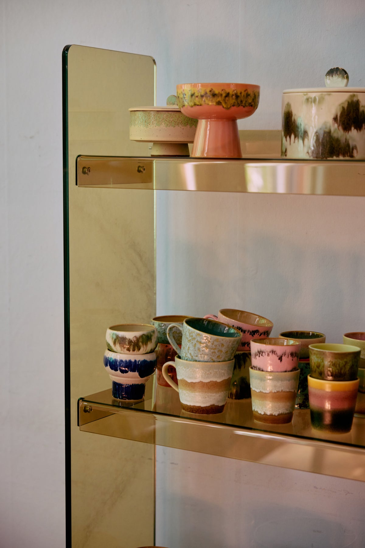 HKLIVING 70s ceramics symbolist lungo mugs styled on a glass shelf
