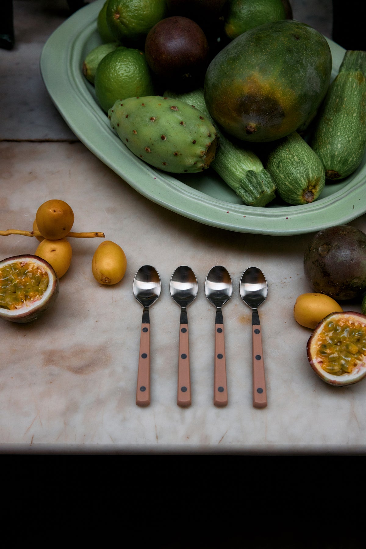 HKLIVING 70s cutlery taupe tea spoons arranged beside fruit on marble surface
