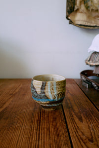 HKLIVING Artist Ceramics coffee cup with scratched pattern adding studio character to a wooden table scene.
