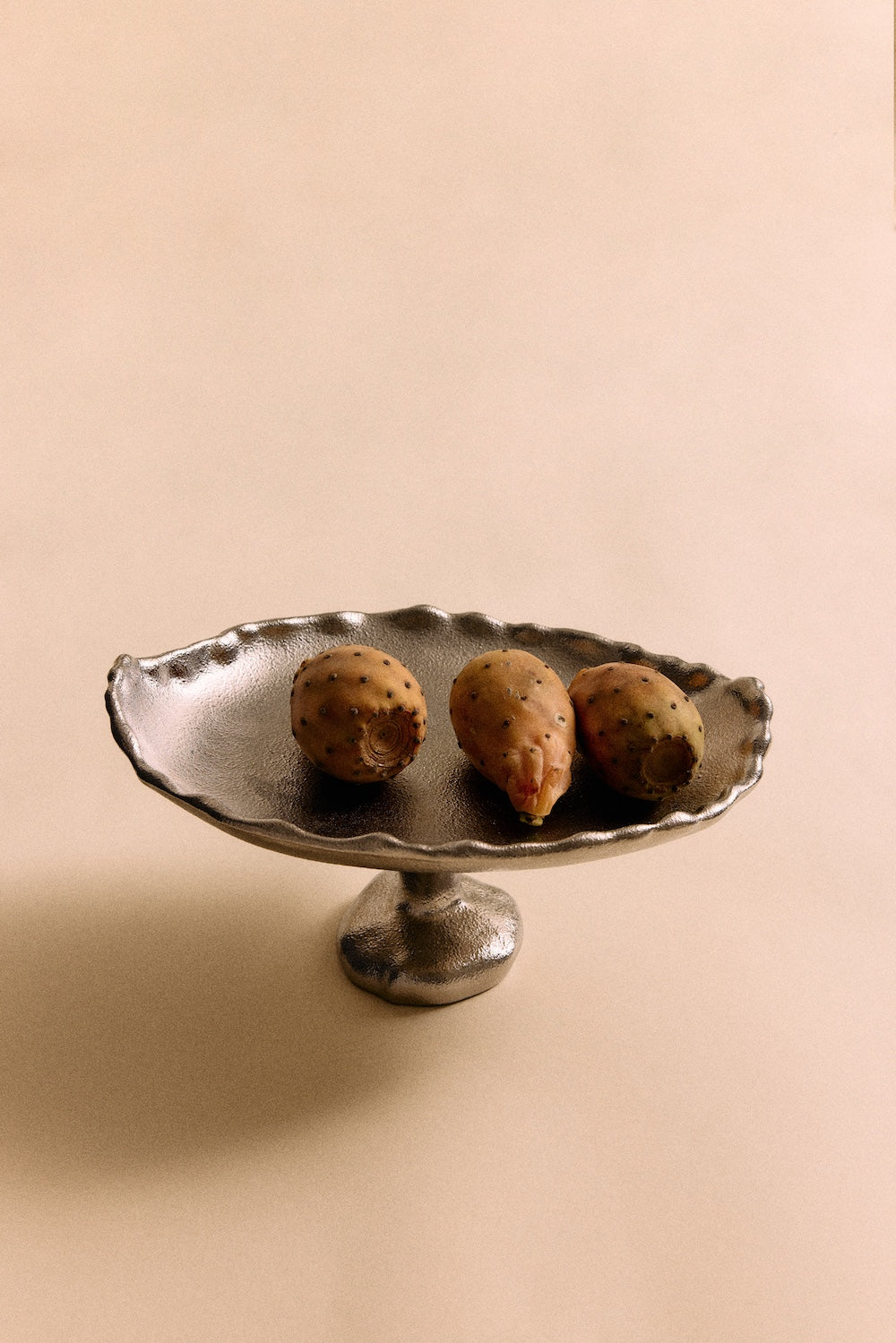 textured chrome stoneware pedestal bowl by hkliving styled as a fruit centrepiece