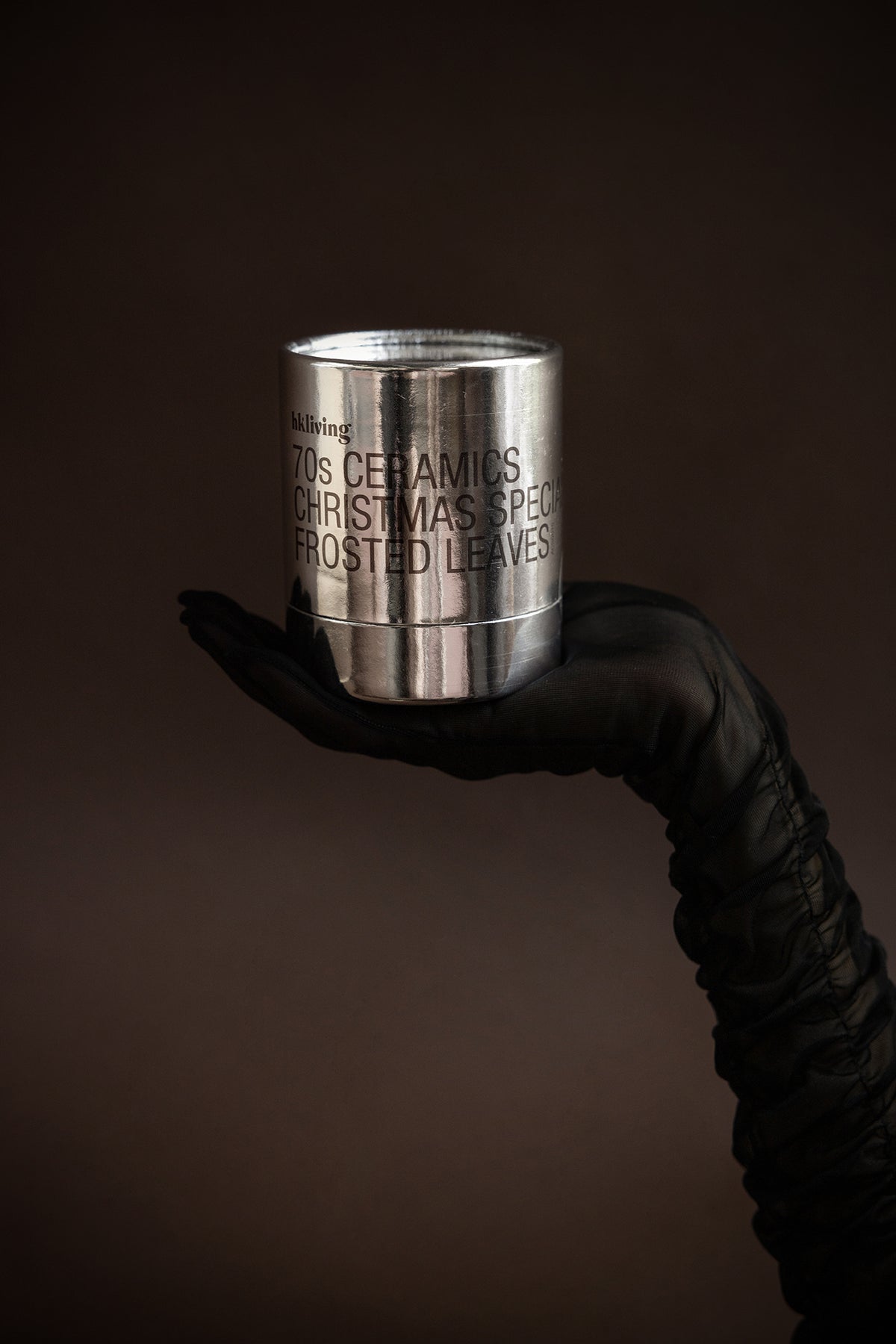HKLIVING Frosted Leaves candle tin held in black gloves – 70s Ceramics Christmas Special