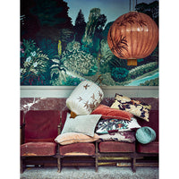 printed Tokyo cushion styled on sofa with warm neutral interiors
